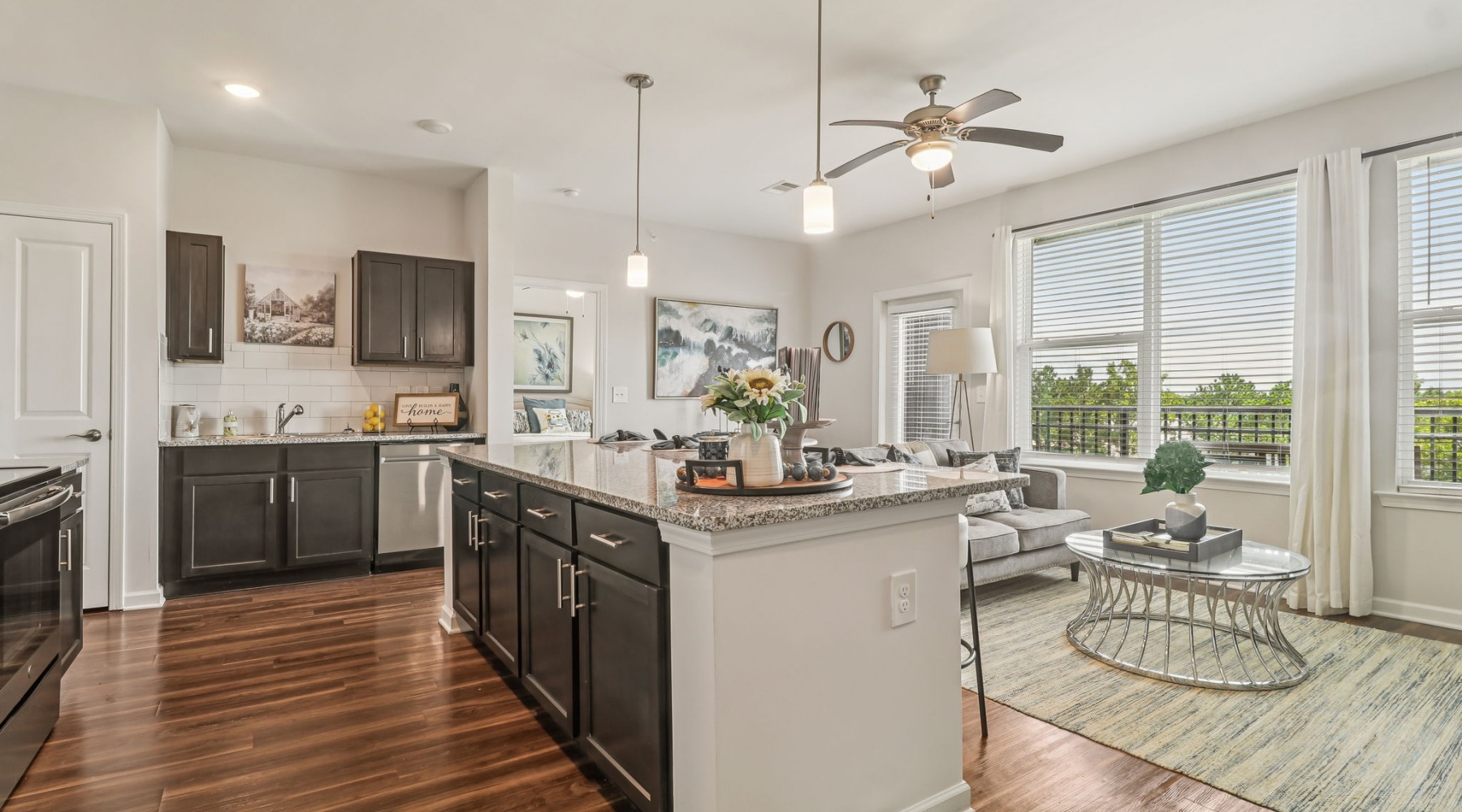 kitchen and living area with ample lighting