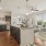 a kitchen with black cabinets