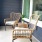 a couple of chairs outside a house