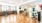 a large living room with a wood floor