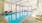 a swimming pool in a large room