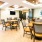 a room with tables and chairs